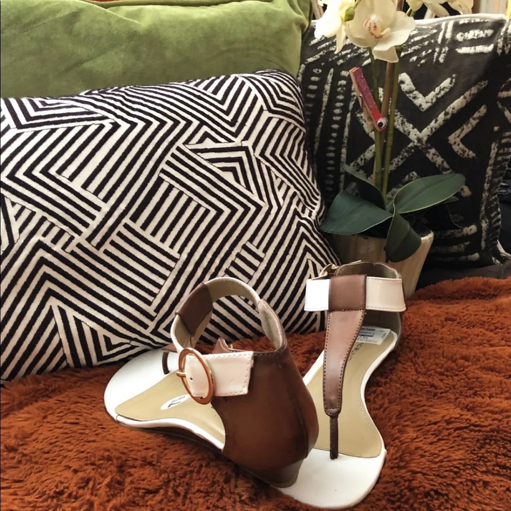 Brown and white leather sandals